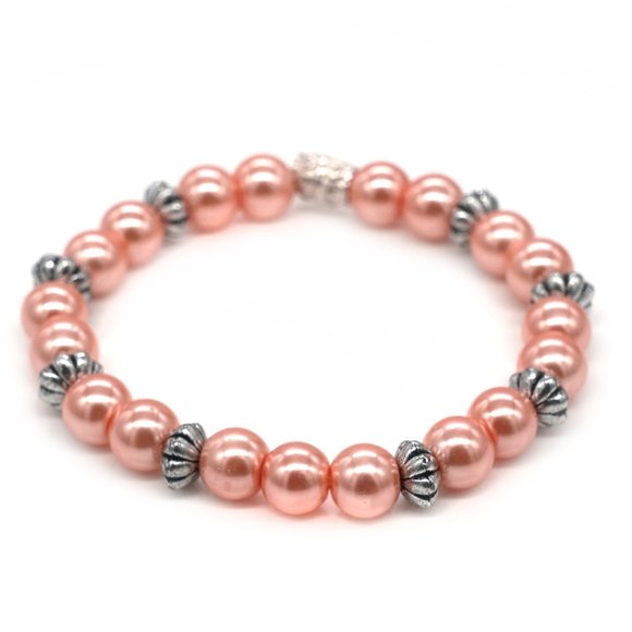 Coral color bracelet with silver spacers. - Picture 2 of 2